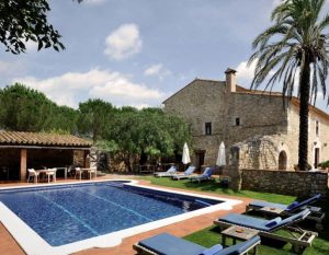 cycling catalonia costa brava mas falgarona swimming pool 300x233 1