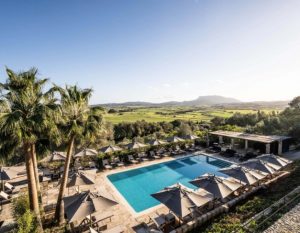cycling mallorca finca serena swimming pool loungers 300x233 1