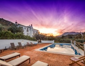 cycling spain andalucia casa olea pool terrace sunset 300x233 1